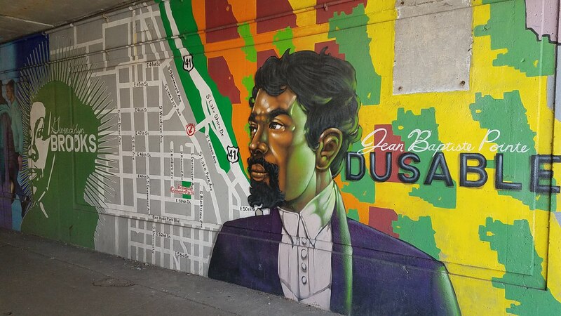 Street art, featuring Chicago pioneer Jean Baptiste Pointe Dusable, in an underpass below the elevated trains in Kenwood, Chicago IL.