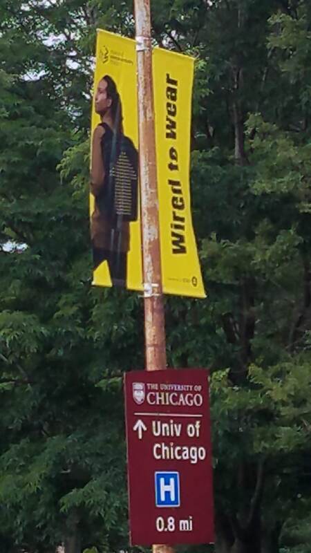A "Wired to Wear" pole banner on one of the streets of the University of Chicago campus.