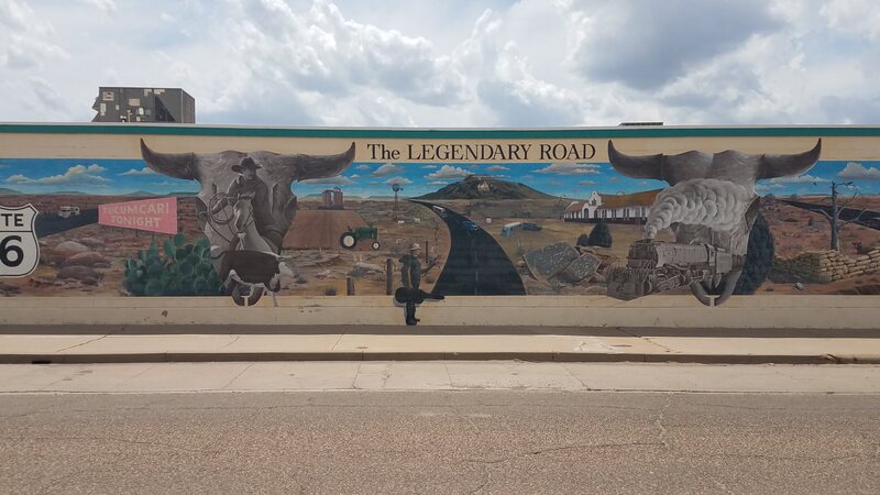 The "Legendary Road" mural in Tucumcari NM features scenes from the history of the Western US and US Highway 66.
