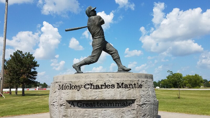 Bronze statue of Mickey Mantle and his home run swing, near Commerce High School in Commerce OK.