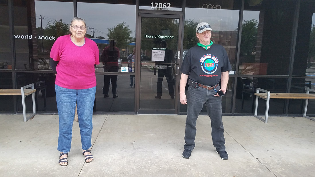 Janis Richards and Hal J. Ridley, Jr., in front of Nokturne restaurant and coffee shop